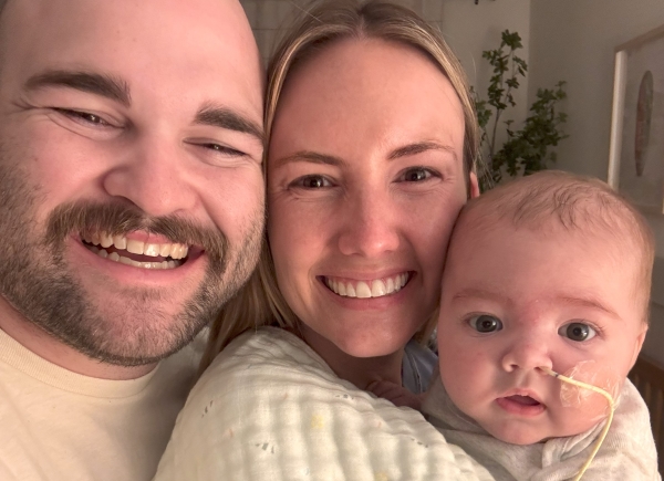 Image of baby Banner and his parents