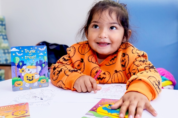 Image of patient in pumpkin sweatshirt