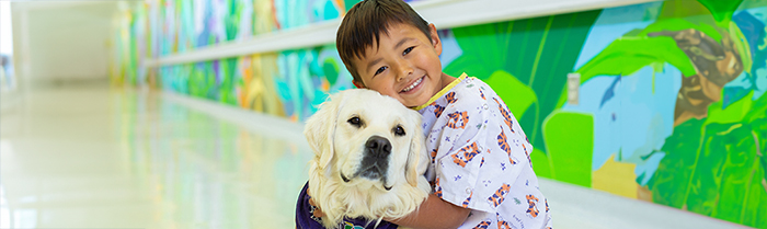 child with dog