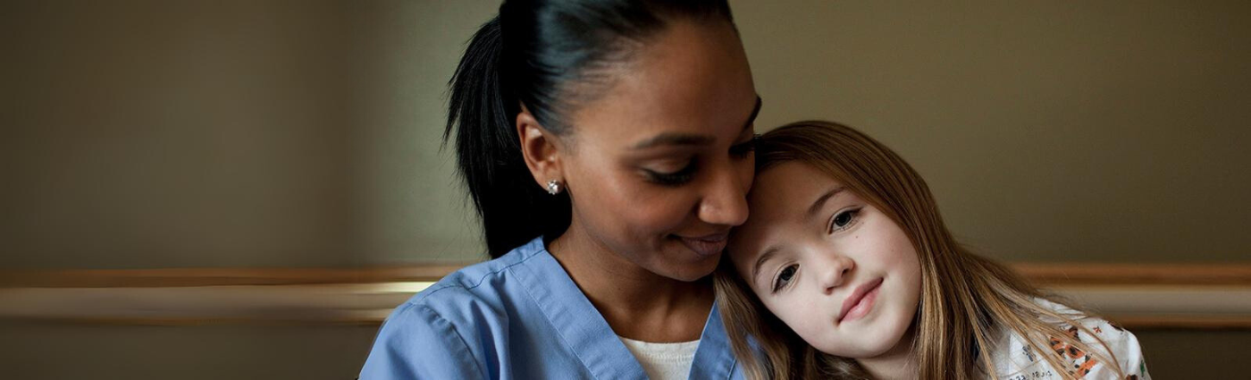 Support Children's Hospital Los Angeles - nurse with girl smiling